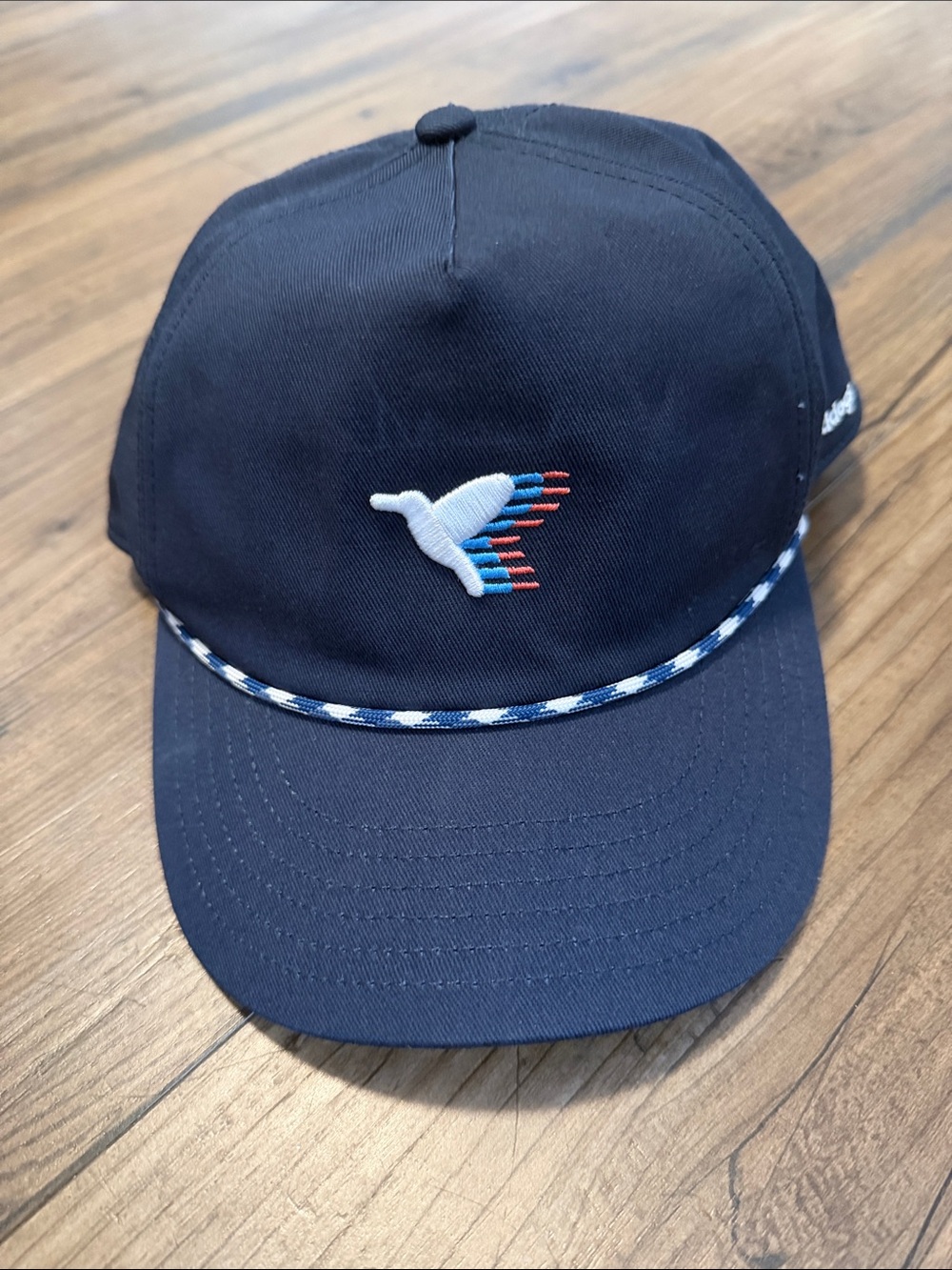 Birddogs Navy Cap with Orange Logo and White Braid